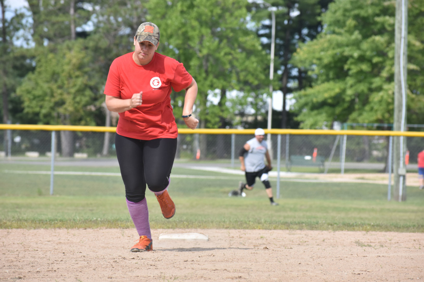 Hustling toward third base